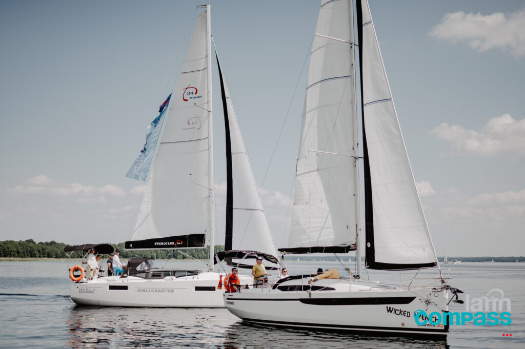 a group of sailboats on water